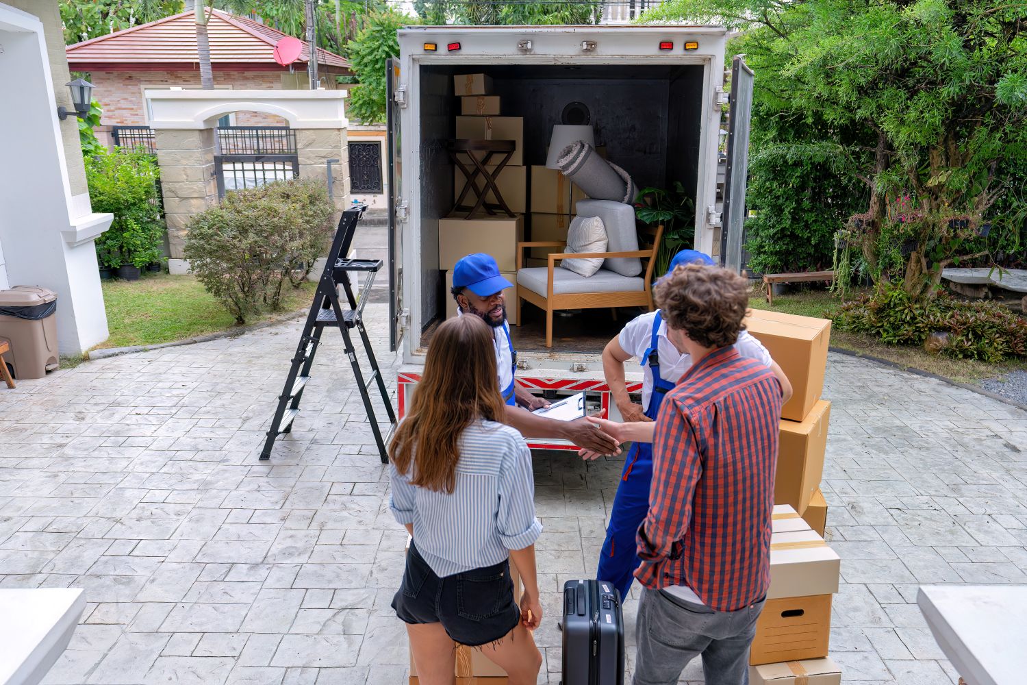 moving truck helping couple